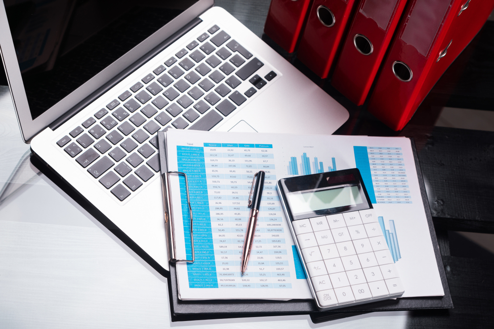 Office,Workplace,With,Documents,And,Stationery,Near,Red,Folders